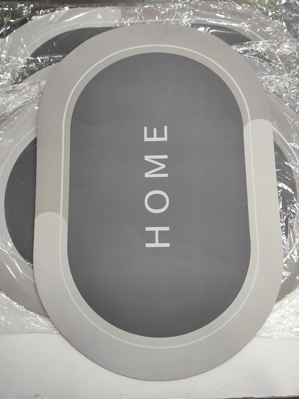 Alfombra de ducha súper absorbente ovalada gris