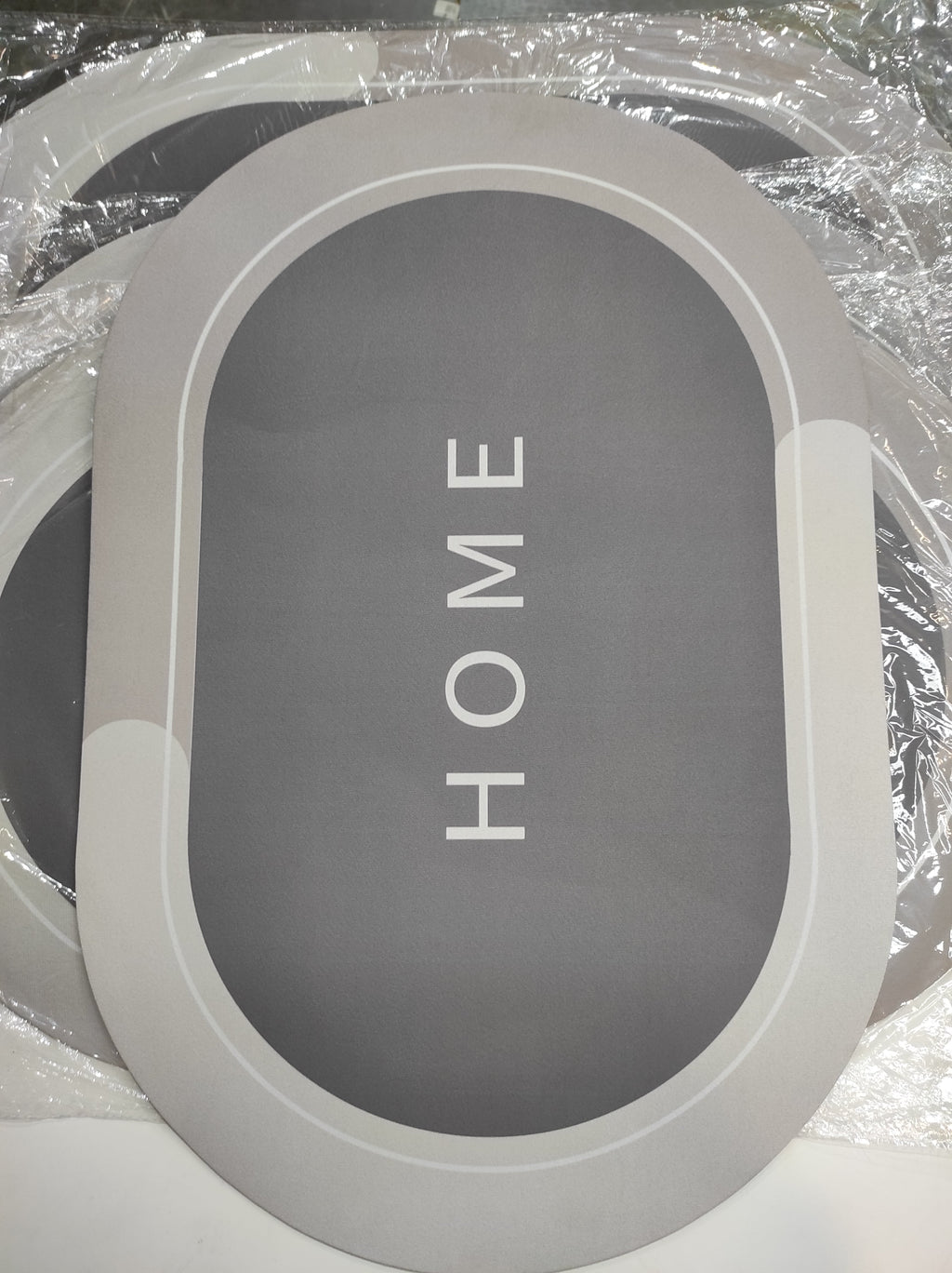 Alfombra de ducha súper absorbente ovalada gris